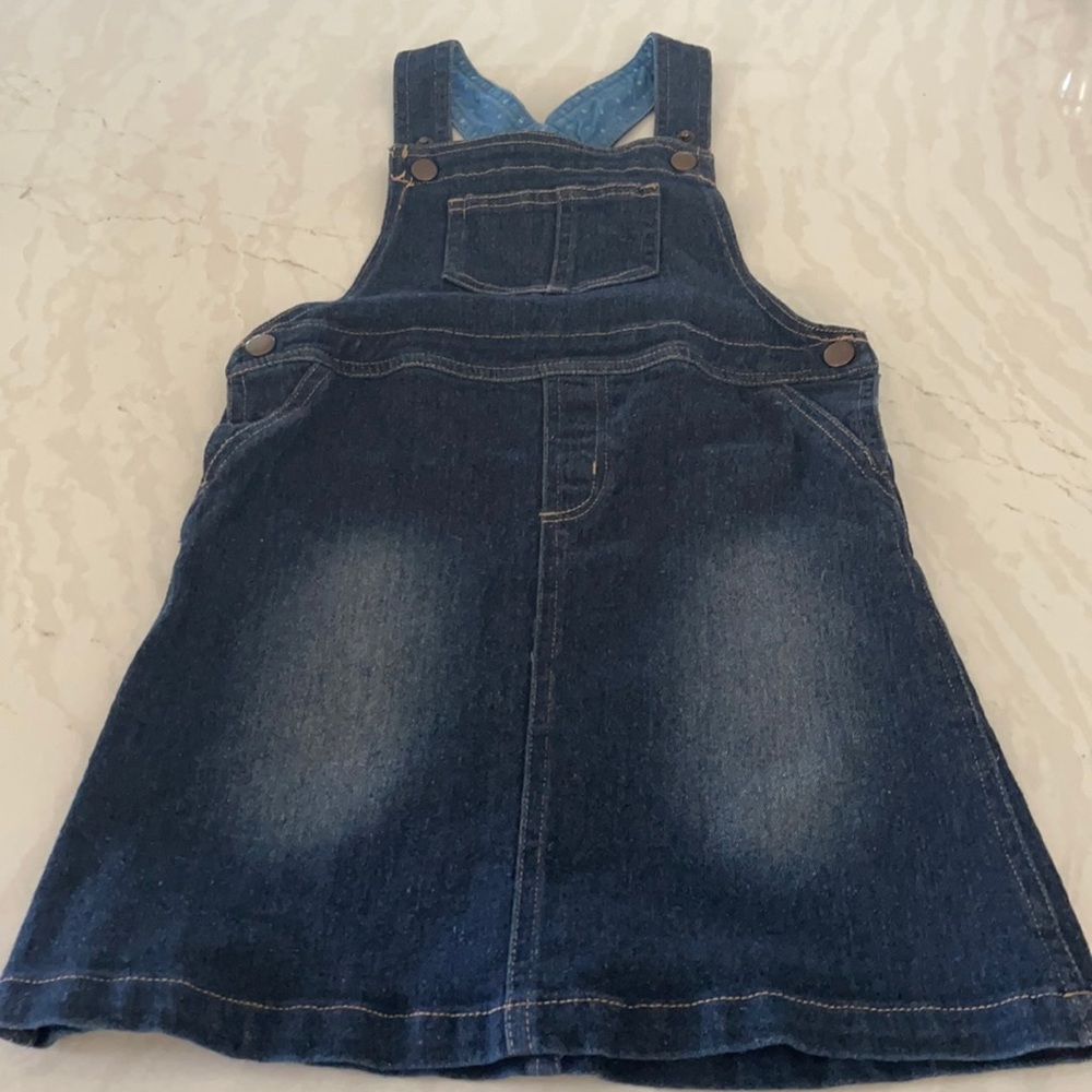 Girls denim overall skirt.